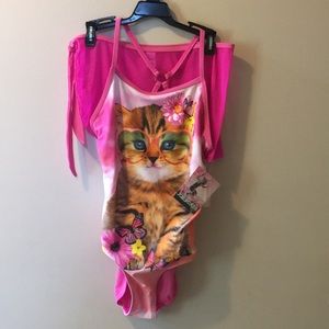 NWT. Swim suit. Girls size 12. Color pink